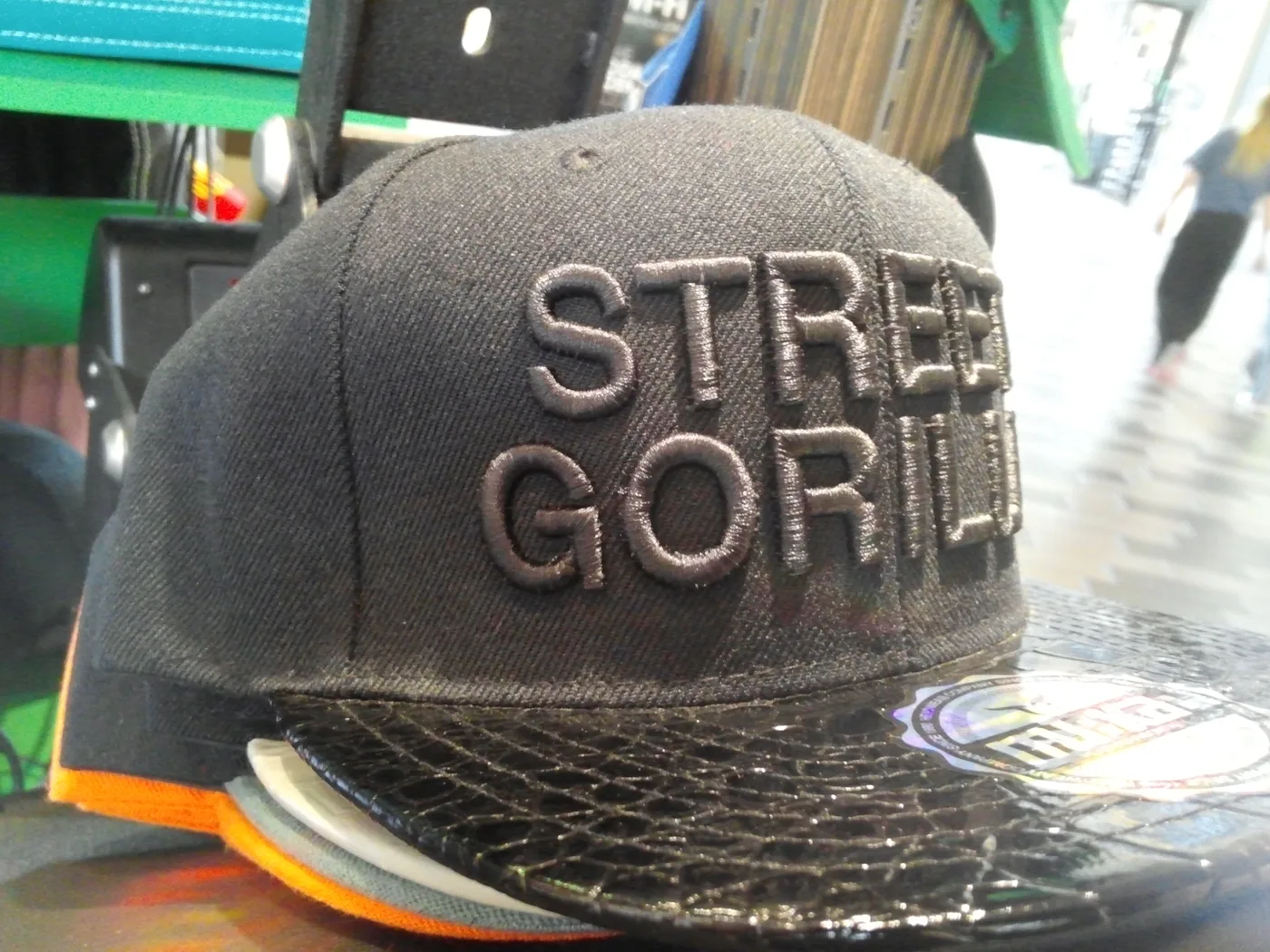Raised 3D embroidery on a grey snapback